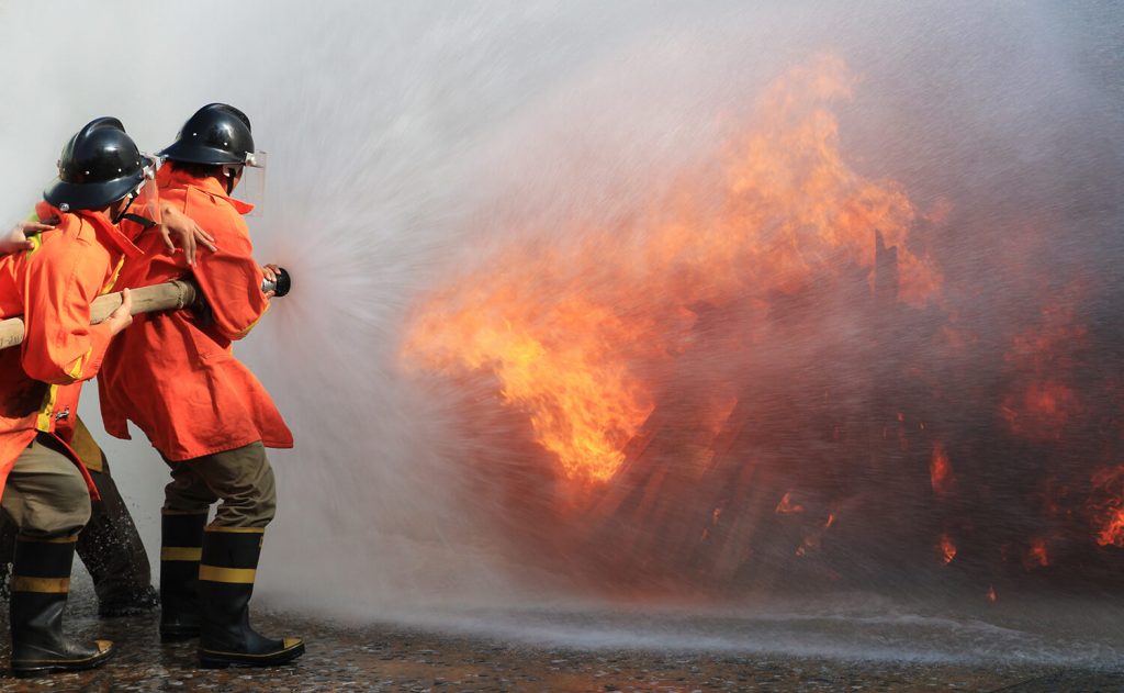 Fire fighting is a. Пожарные борьба с огнем. Пожарные борются с огнем. Портрет пожарного. Пожарная охрана картинки.